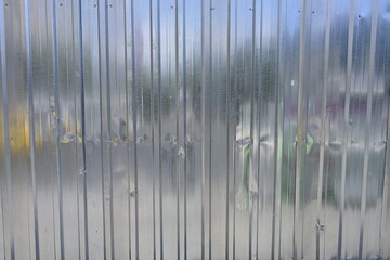 Corrugated Metal Sheet with Reflections