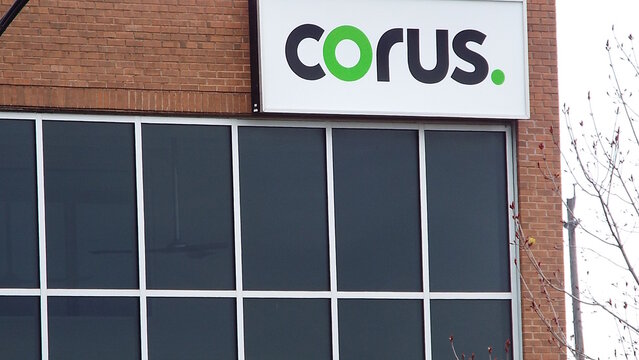 Nepean, ON, Canada-June 13,2025: The exterior of a building with a large sign for "corus" on Merivale Rd. 
