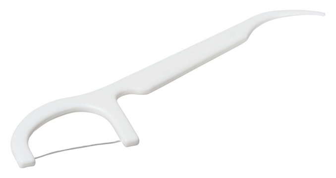 White plastic dental flosser on isolated background. Oral hygiene item