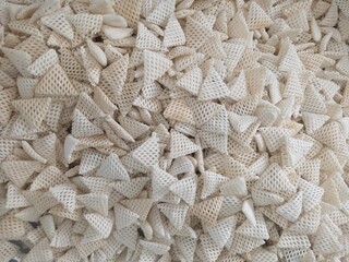 dry mesh-style fryums or papad snacks