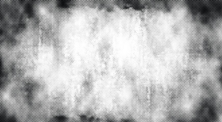 Vector halftone background with irregular grunge dot texture. Abstract distorted pattern with black gradient spots on white backdrop.