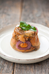 Terrine with milk cap mushrooms and red onion 