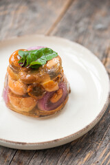 Terrine with milk cap mushrooms and red onion 