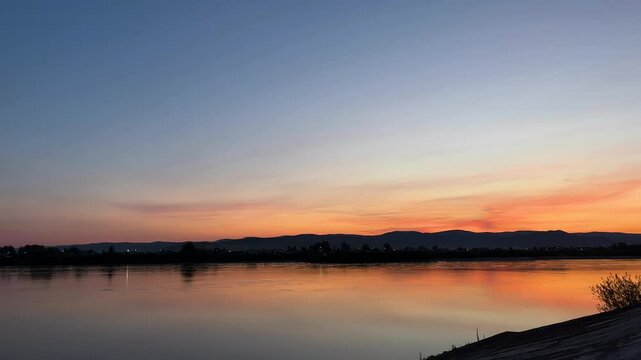 sunset over the river. riverbank embankment