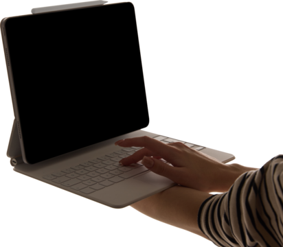 Female hands using tablet with keyboard on transparent background, close up. Concept of technology, digital, communication, app.