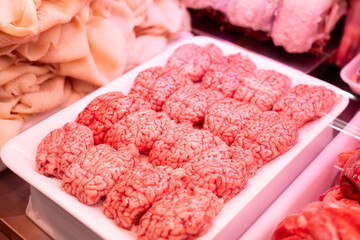 Raw sheep brains on counter of butcher shop