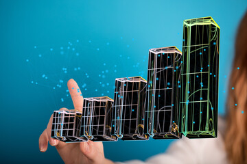 Hand interacting with a 3D bar graph, illustrating data analysis and business growth.