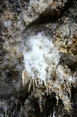 Inside of beautiful old dark cave with many stalactites. Grotte di Is Zuddas, Italy, Sardinia