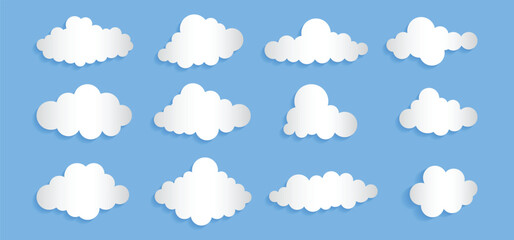 Abstract speech bubbles in clouds shape on blue background. white paper cloud message sign set. cartoon fluffy clouds set