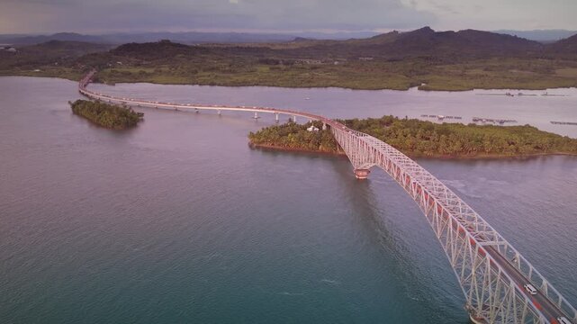 Golden hour over the San Juanico Bridge with gridlocked one way traffic