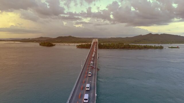 Golden hour over the San Juanico Bridge with gridlocked one way traffic