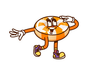 Cartoon groovy Halloween sweet candy character wear hippie boots. Vector funny toffee for kids trick or treat party, holiday pastry dessert retro personage, confectionery caramel with smiling face