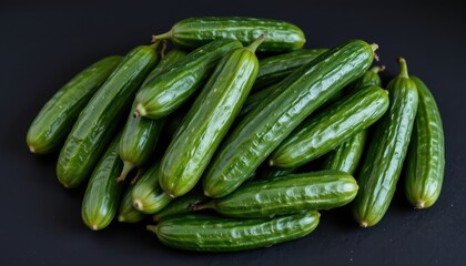 Fresh and Organic Green Cucumbers Gathered in a Bountiful Arrangement on Dark Surface