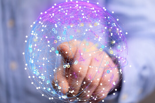 Person interacts with a digital globe, showcasing global network connections and data visualization.