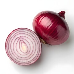 A vibrant red onion halved and whole promises bold flavor for culinary creations on a clean white