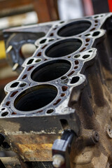 Automotive Engine Parts: Cylinder Head, Engine Block, Crankshaft, Pistons. Overhaul at Car Service.