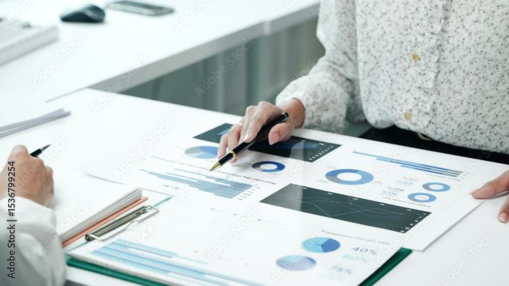 Poster team collaboration in office space business meeting data analysis professional environment overhead 