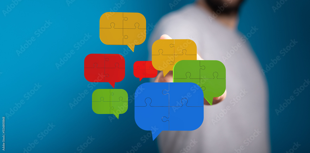 Poster illustrative image of puzzle pieces forming speech bubbles, symbolizing communication and teamwork.