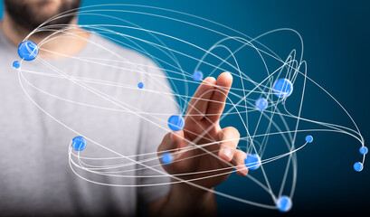 Abstract image of a man's hand interacting with a digital network, representing connection and...