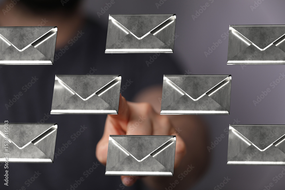 Poster Close-up of a hand selecting digital email messages on a screen.  Concept of communication, inbox, technology.