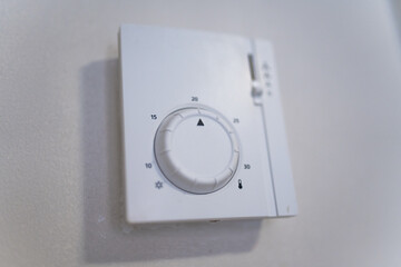 A forced air furnace wall control panel closeup. Heating system for house or apartment.