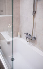 Tub shower door, bathroom shower glass door. Fixed glass panel in the bathroom.