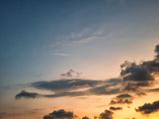 Beautiful sky background in the afternoon- Sunset sky with orange light clouds with cloudy sky.