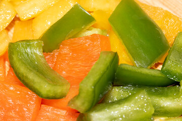 Close up of chopped cubed sweet pepper vegetables