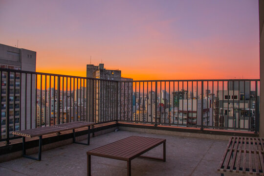 sunset or sunrise on the rooftop zen balcony in S&atilde;o Paulo urban center tourism