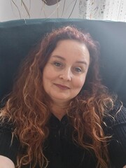 an older woman with red hair