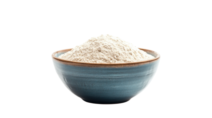 Fluffy mound of flour nestled in a rustic blue bowl, highlighting the simplicity of baking and culinary creativity in a cozy kitchen setting.