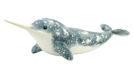 Softly colored narwhal plush toy resting on a white background, showcasing intricate patterns and textures that highlight its enchanting design qualities.