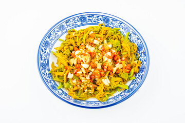 A dish of salad daylily on a white background
