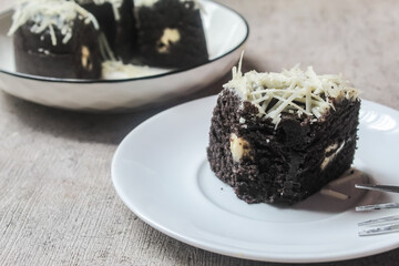 slice of cake on a plate with a fork