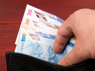 Trinidad and Tobago dollars in the black wallet
