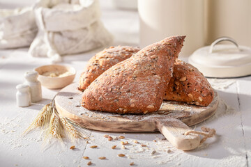 Tasty and homemade triangular rolls freshly baked in home bakery.
