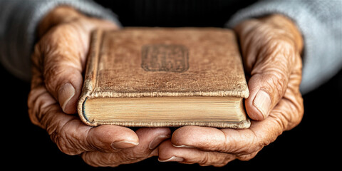 Close-up of an elderly woman reading an antique book. A peaceful moment that reflects wisdom, history, and a deep connection to the past.