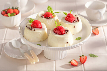 Sweet and chilly monoportion cheesecake made with berries and sprinkles.