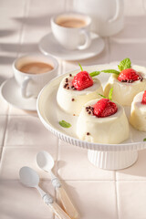 Sweet and chilly monoportion cheesecake served with coffee in summer.