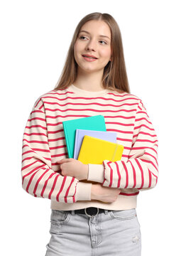 Fototapeta Teenage girl with notebooks on white background