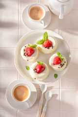 Sweet and chilly monoportion cheesecake with strawberry mousse and vanilla.