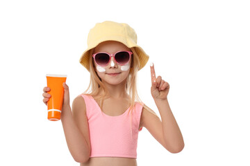 Cute little girl with tube of sun protection product on white background