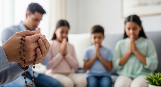 Family prayer gathering with rosary: parents and children practicing faith together