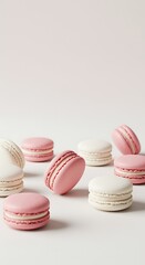 Obraz premium Pink and White Macarons on White Background pink macarons