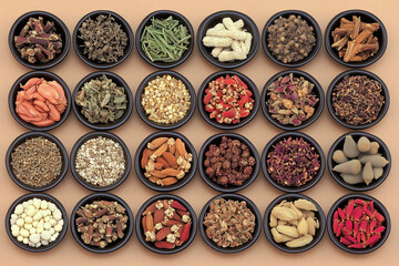 Various Traditional Chinese Herbal Medicine Ingredients Displayed as Background Concept