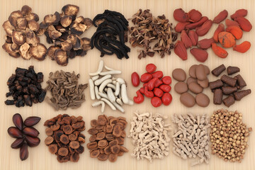 Various Traditional Chinese Herbal Medicine Ingredients Displayed as Background Concept