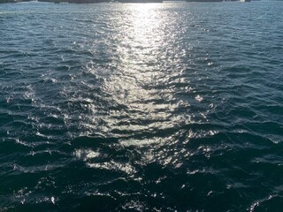sea waves ripples on the sea with sunlight reflection 