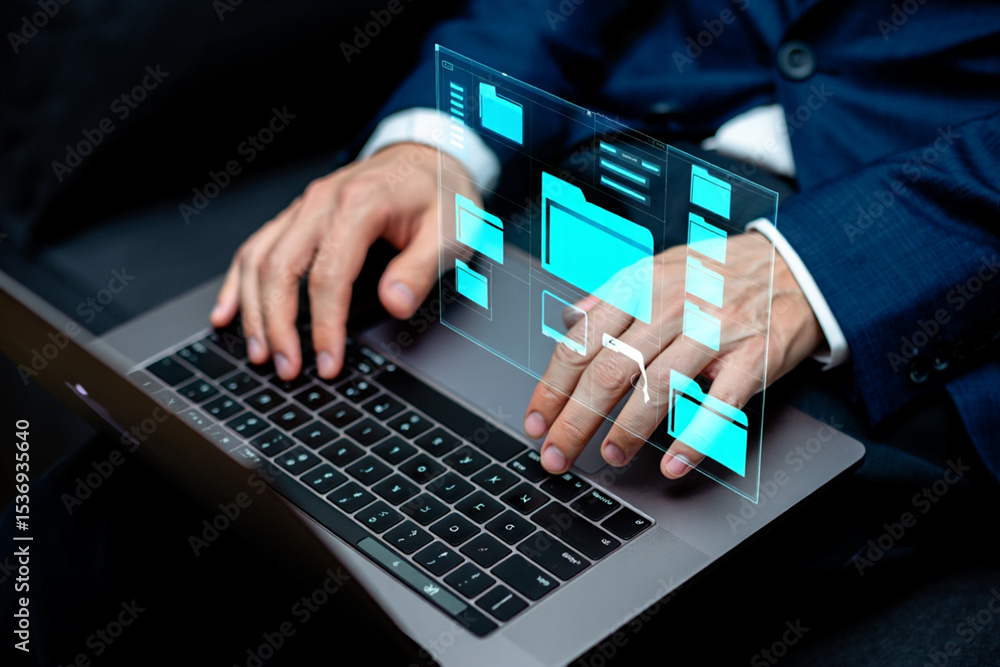 Poster businessman using laptop with digital interface showing data files and folders