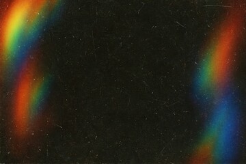 Dark background with rainbow light leaks overlay texture