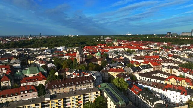 Aerial drone view of Kirche St. Anna (Pfarrkirche St. Anna), a historic Catholic church with Baroque architecture, located in the Lehel district of Munich, Germany . 
